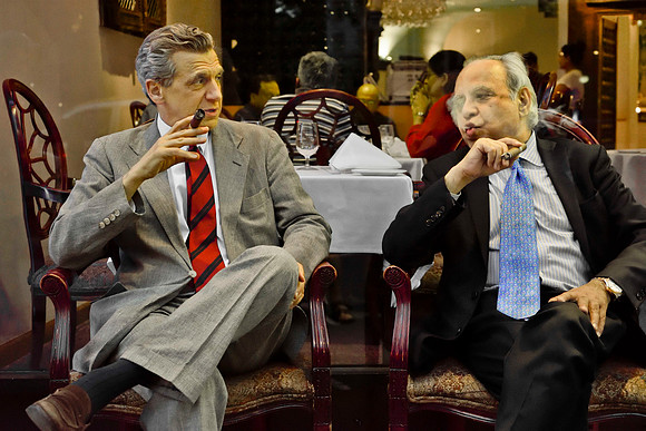 Friends with after dinner cigars - NYC, 2018