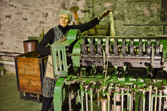 Guide discussing jute mill machinery - Verdant Works museum - Dundee, Scotland, 2018